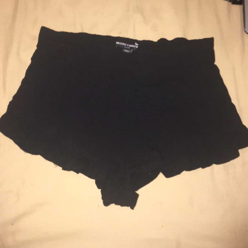 Brandy Melville black ruffled-hem shorts